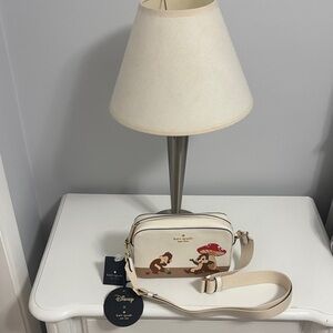 kate spade cream Disney woodland crossbody with red mushroom detail